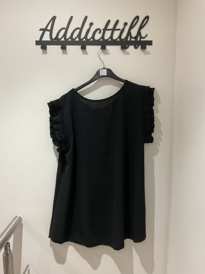 Blouse à volants